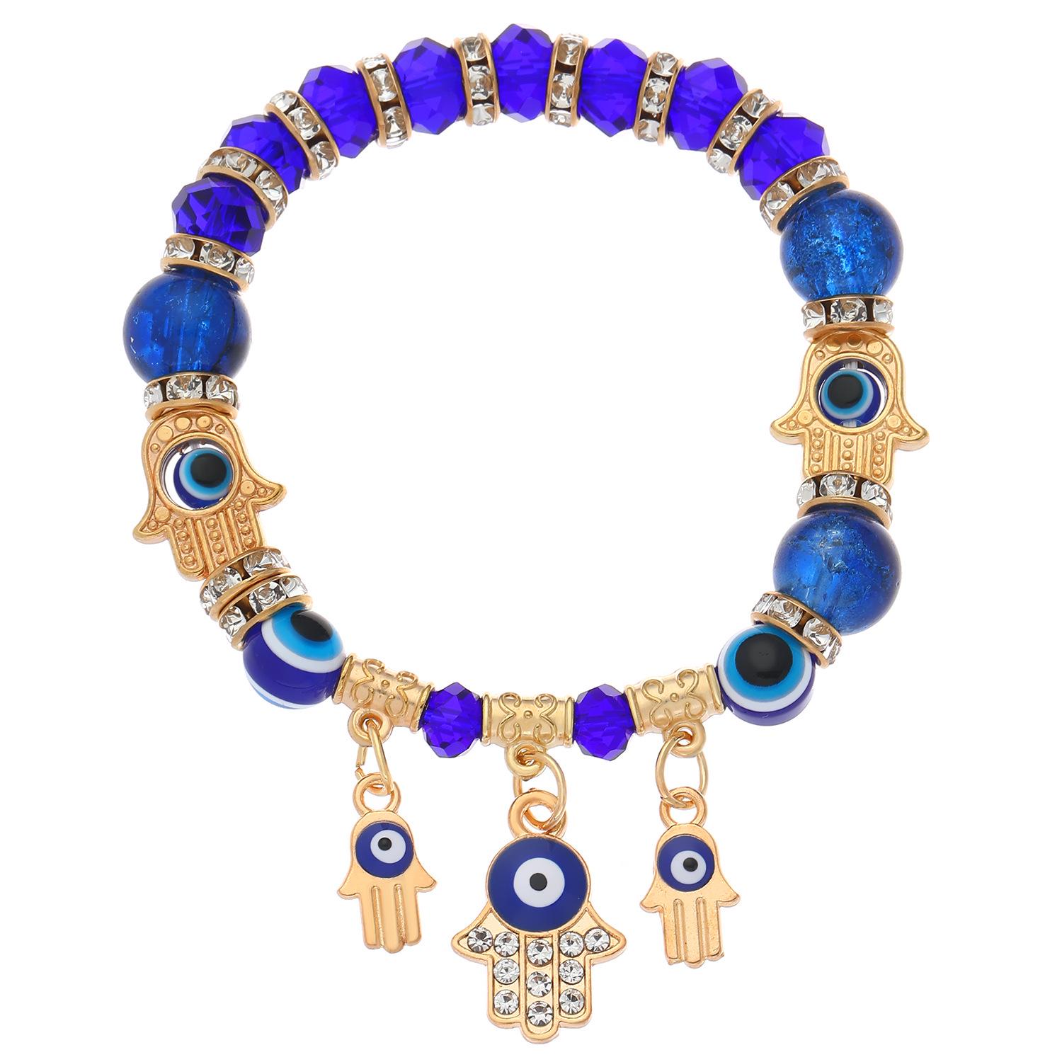 Браслет из смоляных бусин «Синий глаз» с подвеской «Рука Фатимы»